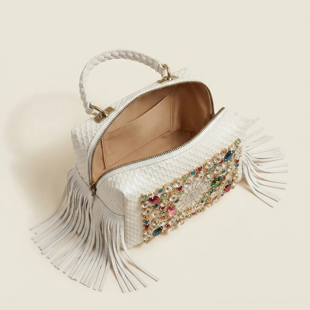 Interior lining and pockets of White large fringe clutch bag
