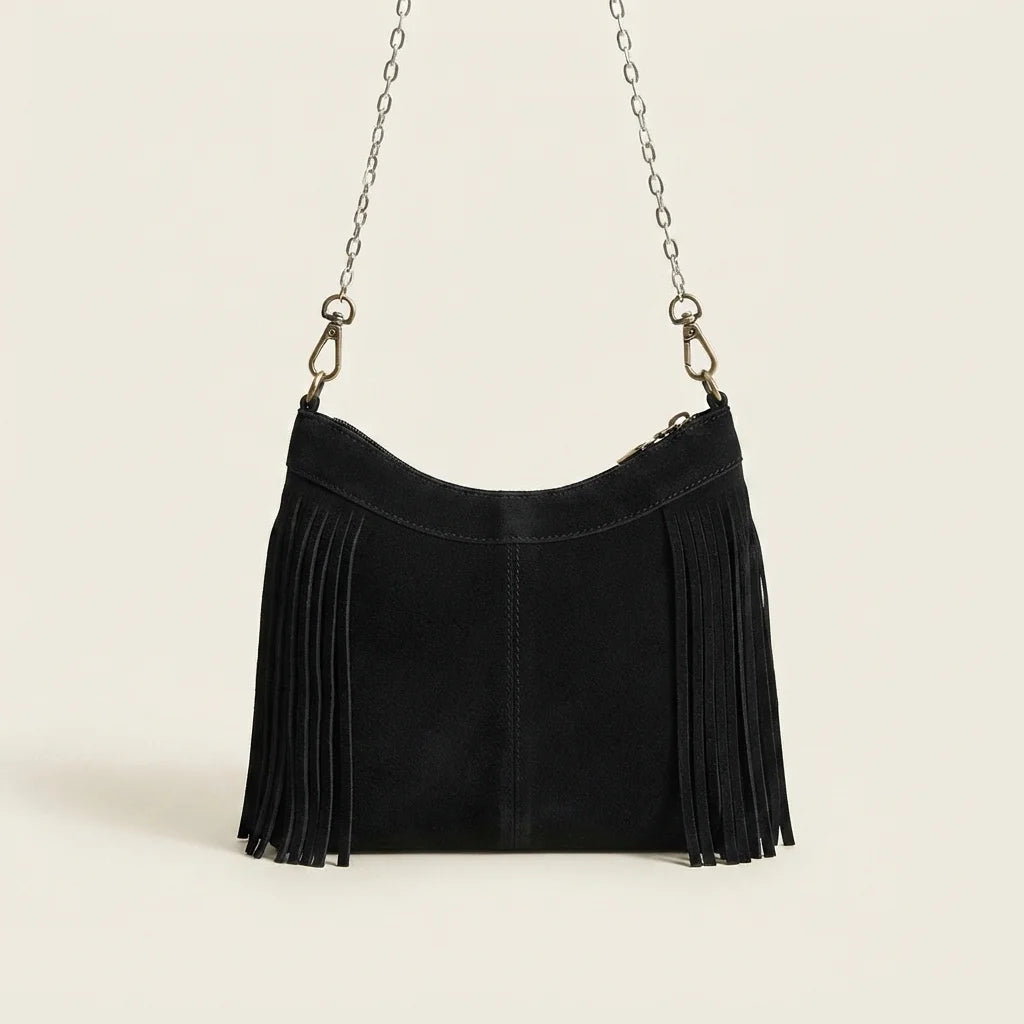 Back panel of Black large fringe crossbody bag with strap attachments