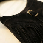Close-up of fringe stitching and texture on Black large fringe crossbody bag