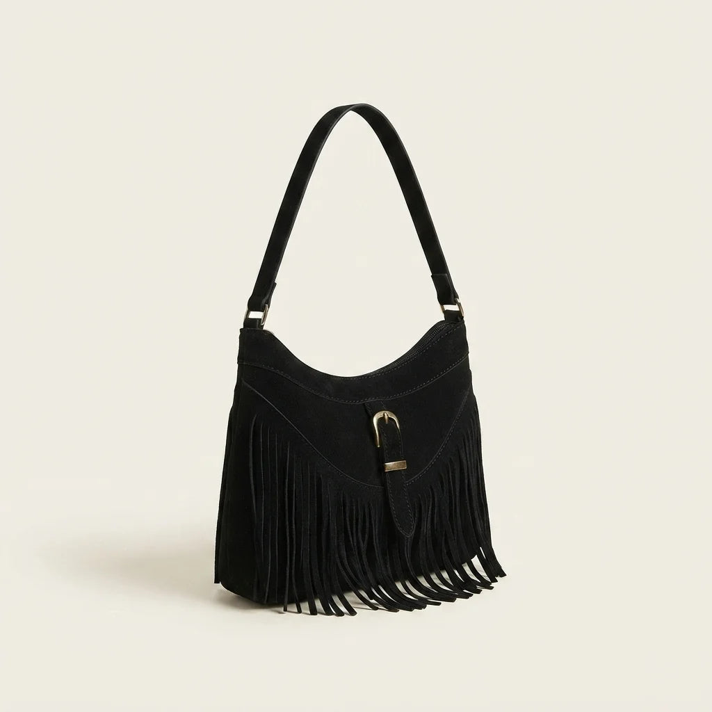 Black large fringe crossbody bag, three-quarter angle showing side depth