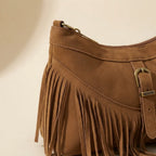 Close-up of fringe stitching and texture on Coffee large fringe crossbody bag
