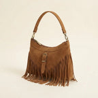 Coffee large fringe crossbody bag, three-quarter angle showing side depth