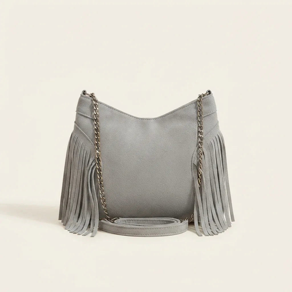Back panel of Grey large fringe crossbody bag with strap attachments