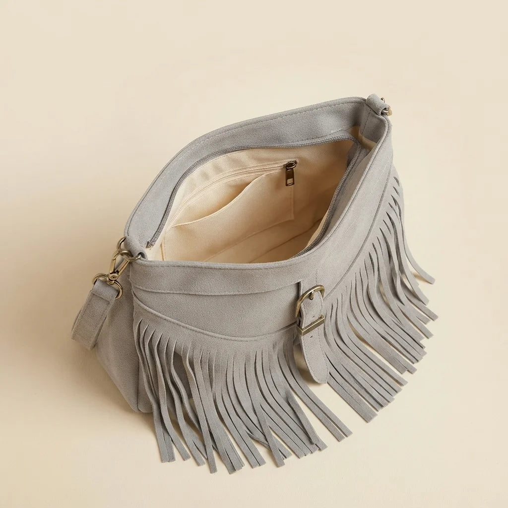 Interior lining and pockets of Grey large fringe crossbody bag