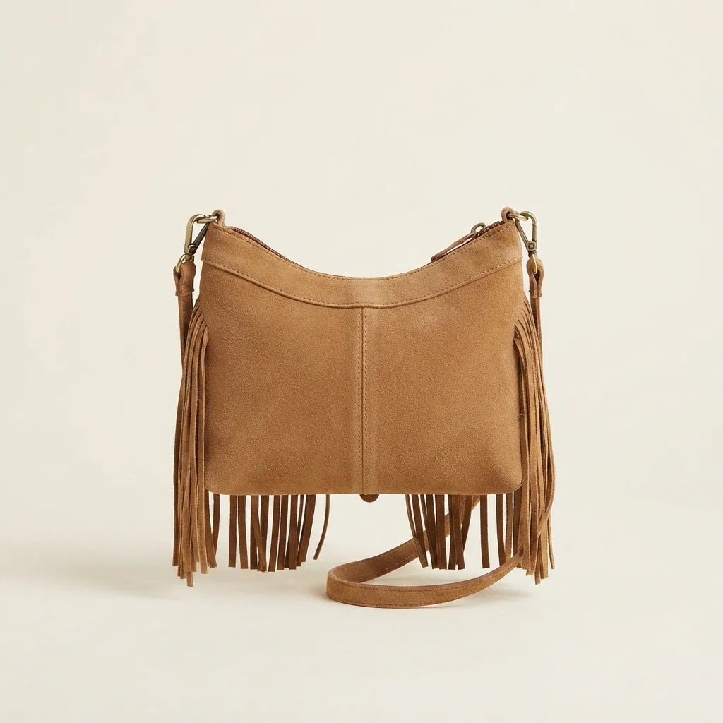 Back panel of Light Brown large fringe crossbody bag with strap attachments