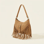 Light Brown large fringe crossbody bag, three-quarter angle showing side depth