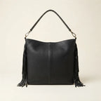 Back panel of Black large fringe faux leather hobo bag with strap attachments