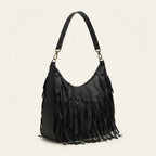 Black large fringe faux leather hobo bag, three-quarter angle showing side depth