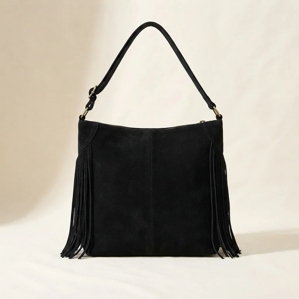 Back panel of Black large fringe hobo bag with strap attachments