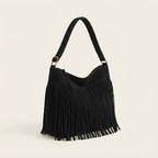 Black large fringe hobo bag, three-quarter angle showing side depth
