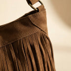 Close-up of fringe stitching and texture on Brown large fringe hobo bag