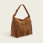 Brown large fringe hobo bag, three-quarter angle showing side depth