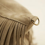 Close-up of fringe stitching and texture on Khaki large fringe hobo bag