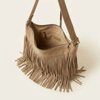 Interior lining and pockets of Khaki large fringe hobo bag