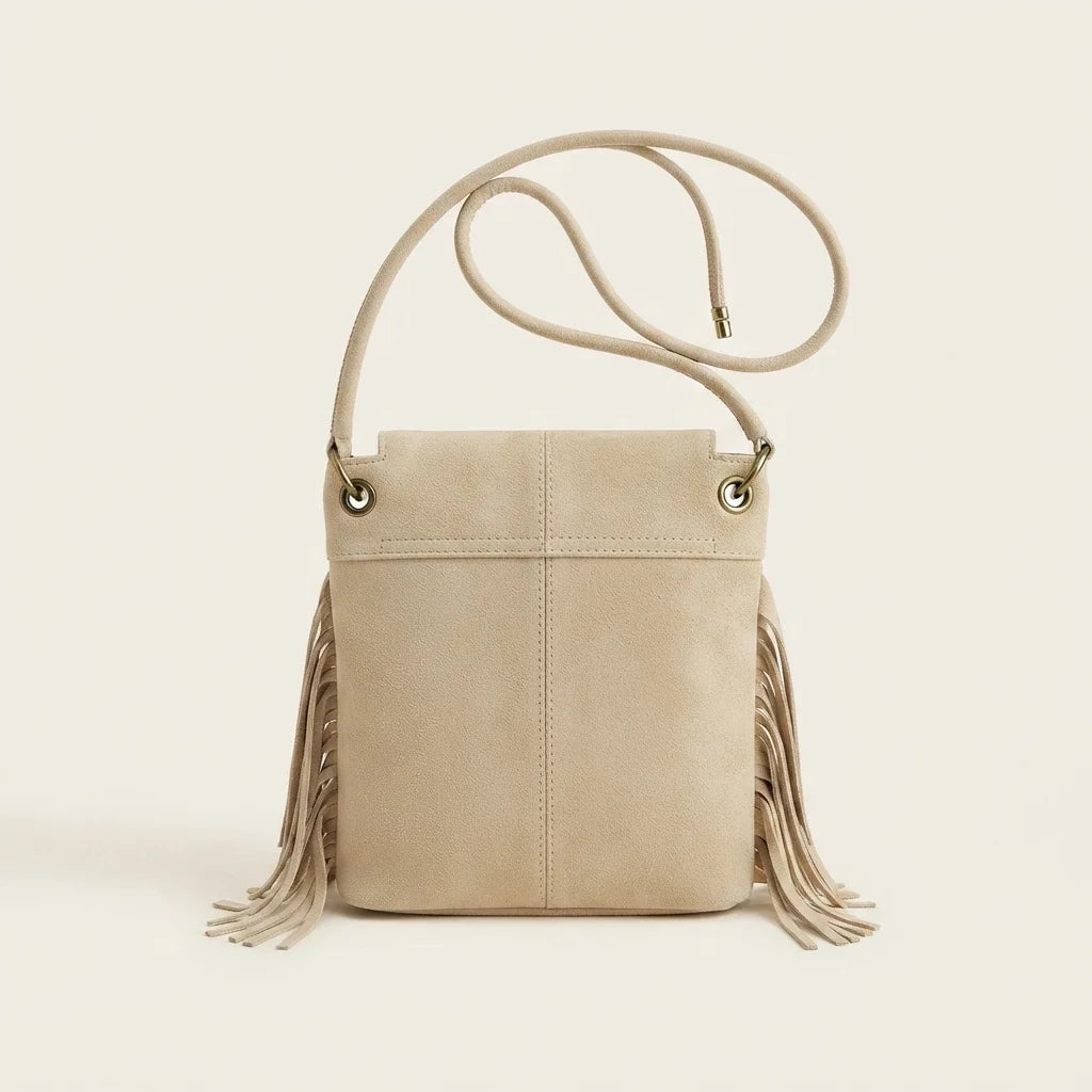 Back panel of Beige large fringe shoulder bags with strap attachments