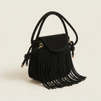 Black large fringe shoulder bags, three-quarter angle showing side depth