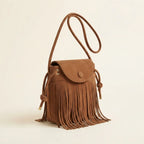 Brown large fringe shoulder bags, three-quarter angle showing side depth