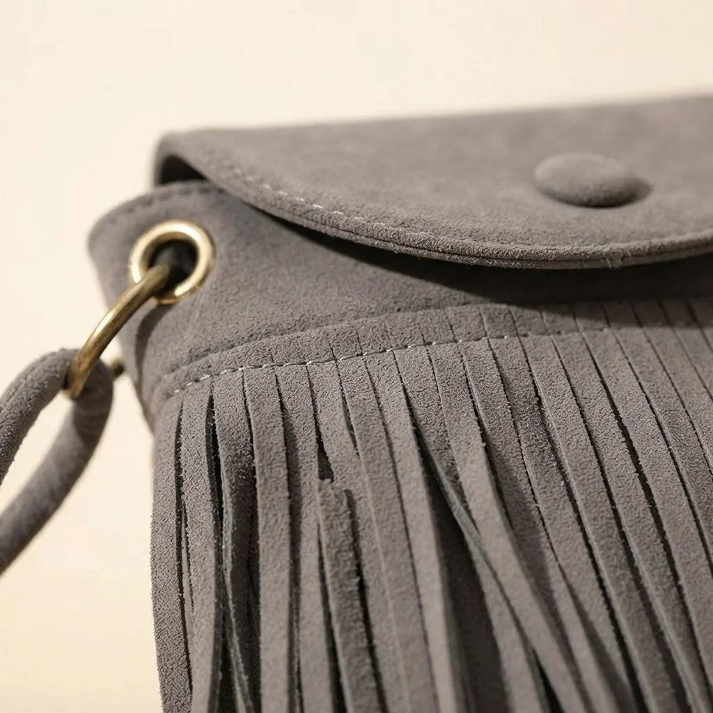 Close-up of fringe stitching and texture on Grey large fringe shoulder bags