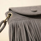 Close-up of fringe stitching and texture on Grey large fringe shoulder bags
