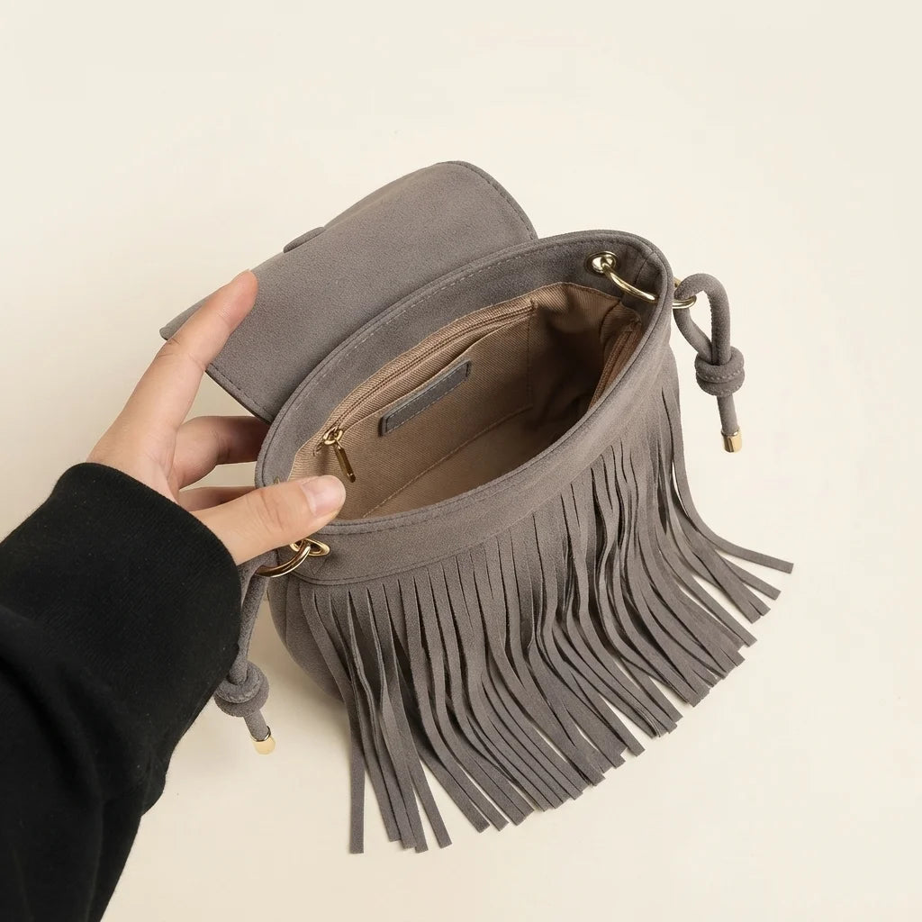 Interior lining and pockets of Grey large fringe shoulder bags