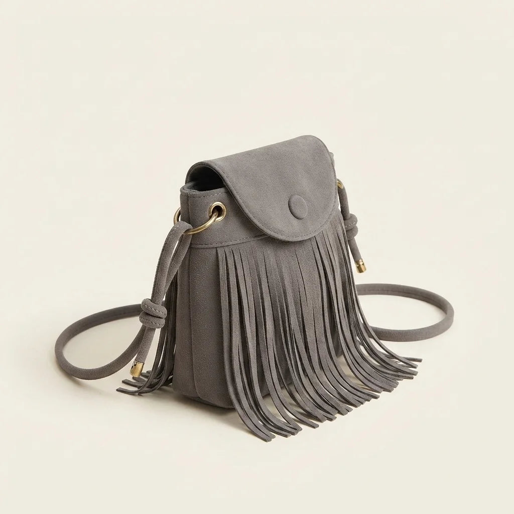 Grey large fringe shoulder bags, three-quarter angle showing side depth