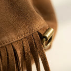 Close-up of fringe stitching and texture on Brown large hippie fringe bag
