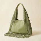 Green large hippie fringe bag, three-quarter angle showing side depth