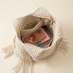 Interior lining and pockets of Beige large macrame fringed tote bag