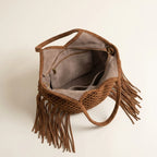 Interior lining and pockets of Brown large macrame fringed tote bag