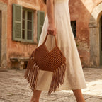 Woman wearing Brown large macrame fringed tote bag with swaying fringe