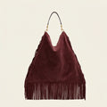 Maroon large suede fringe bag, front view