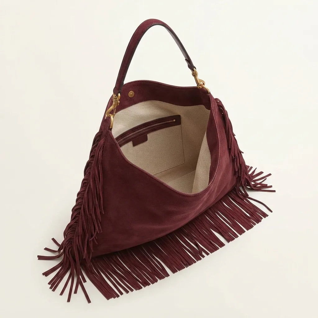 Interior lining and pockets of Maroon large suede fringe bag