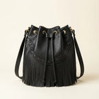 Black leather bucket bag with fringes, front view