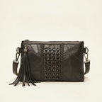 Black leather clutch bags with side fringe, front view