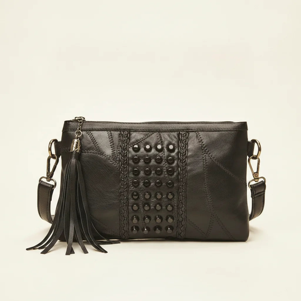 Black leather clutch bags with side fringe, front view