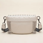 Back panel of Beige leather fringe belt bag with strap attachments