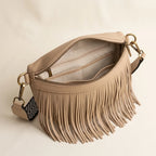 Interior lining and pockets of Beige leather fringe belt bag