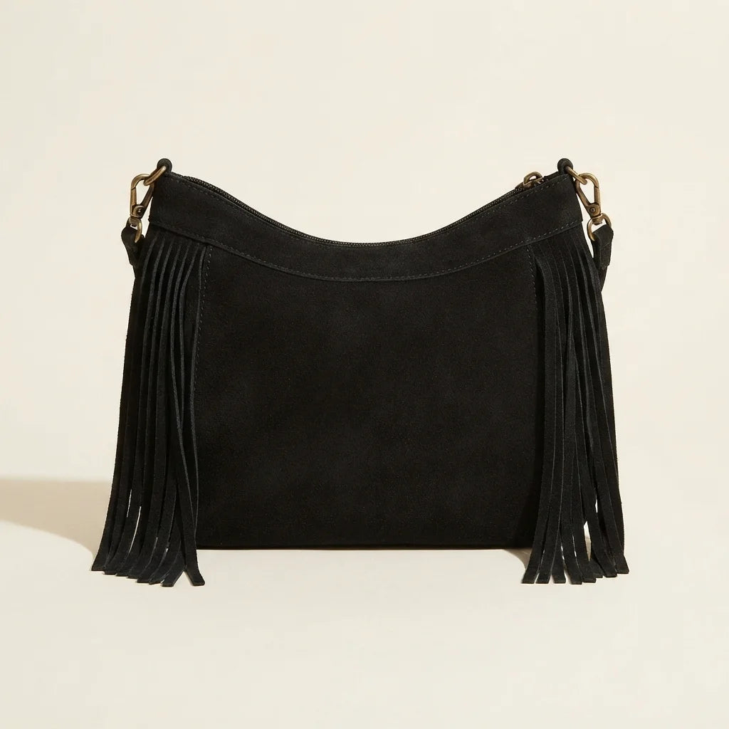 Back panel of Black leather fringe messenger bag with strap attachments