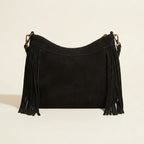 Back panel of Black leather fringe messenger bag with strap attachments