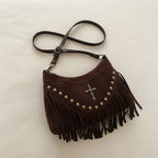 Brown leather fringe messenger bag, three-quarter angle showing side depth