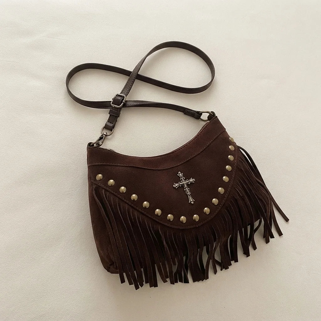 Brown leather fringe messenger bag, three-quarter angle showing side depth
