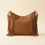Back panel of Coffee leather fringe messenger bag with strap attachments
