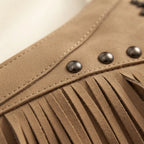 Close-up of fringe stitching and texture on Khaki leather fringe messenger bag