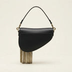 Back panel of Black leather saddle bag fringe with strap attachments