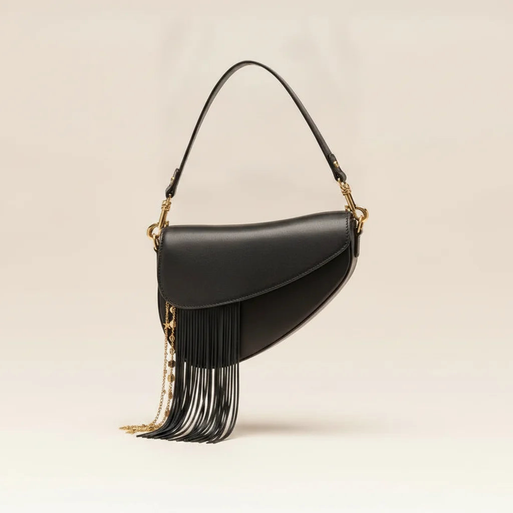 Black leather saddle bag fringe, three-quarter angle showing side depth