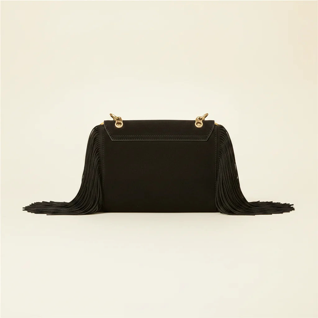 Back panel of Black long fringe clutch bag with strap attachments