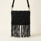Back panel of Black macrame fringe bag with strap attachments