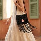 Woman wearing Black macrame fringe bag with swaying fringe