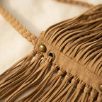 Close-up of fringe stitching and texture on Khaki macrame fringe bag