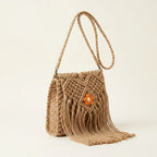 Khaki macrame fringe bag, three-quarter angle showing side depth